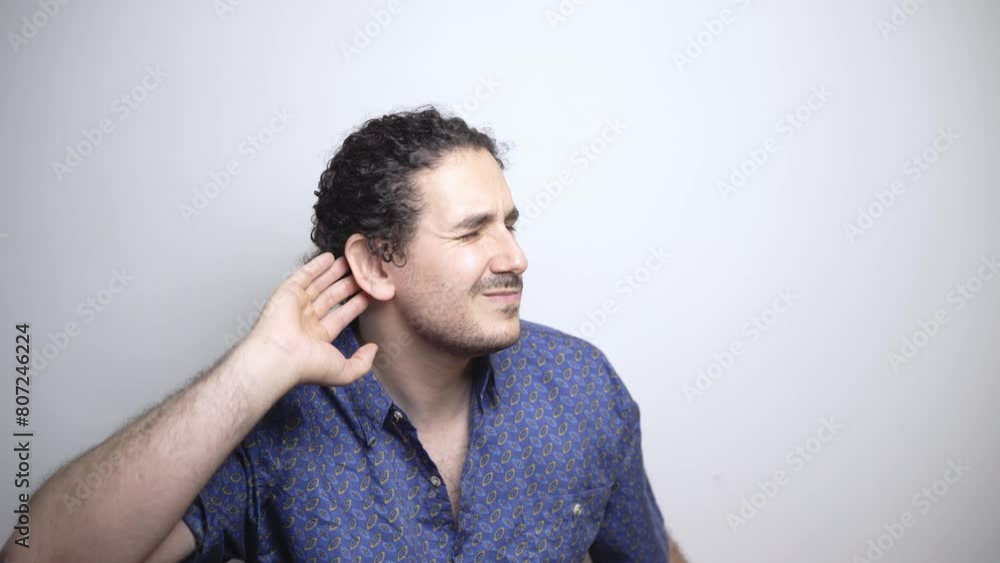 Deaf person points to ear because of hearing problem Deaf person points to ear because of hearing problem