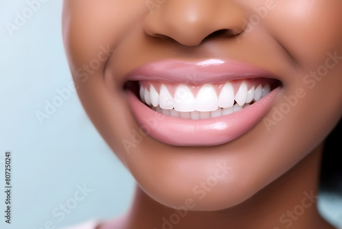 Bright smiling african american woman with perfect pearly white teeth