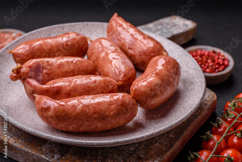 Baked chicken or pork sausages, salt, spices and herbs