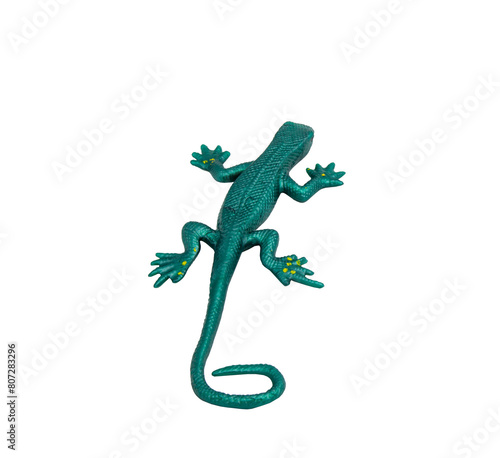 Green rubber lizard toy with no background. Stretchable toy. Anti-stress. Horizontal photo. For text.