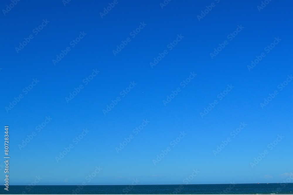 Panoramic view of the blue sky and sea waves Panoramic view of the blue sky and sea waves