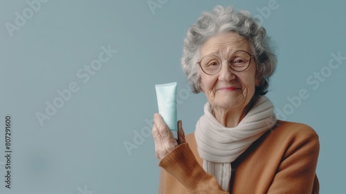 Elderly Woman Holding Skin Cream Tube Generative AI