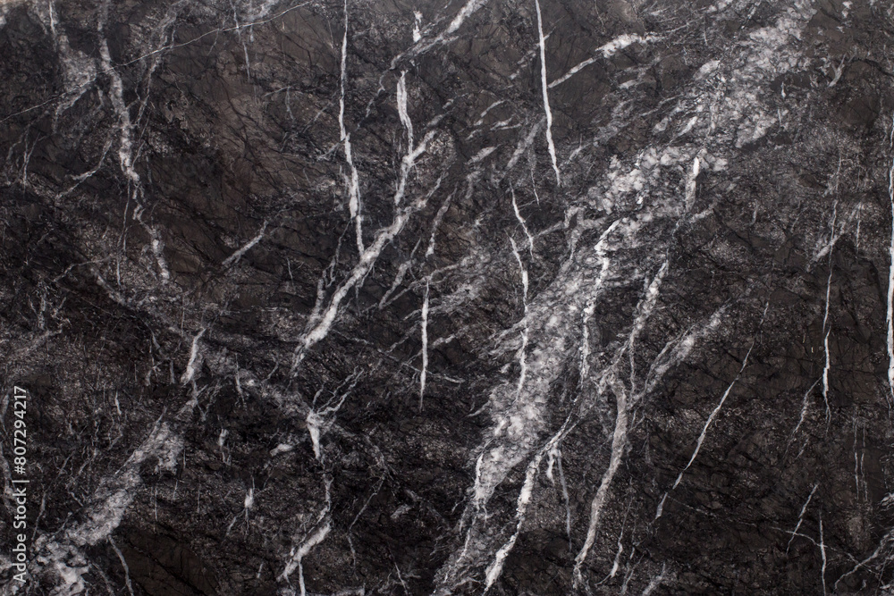 Close up of black marbling texture. High resolution photo.Nice background for design projects. Grigio Carnico marble Close up of black marbling texture. High resolution photo.Nice background for design projects. Grigio Carnico marble
