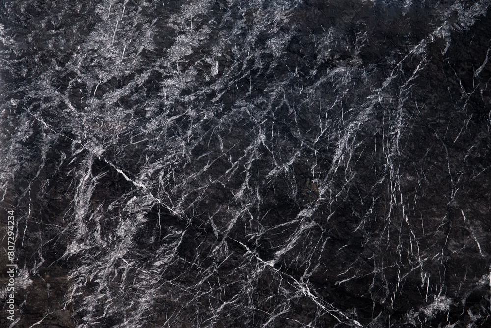 Close up of black marbling texture. High resolution photo.Nice background for design projects. Grigio Carnico marble Close up of black marbling texture. High resolution photo.Nice background for design projects. Grigio Carnico marble