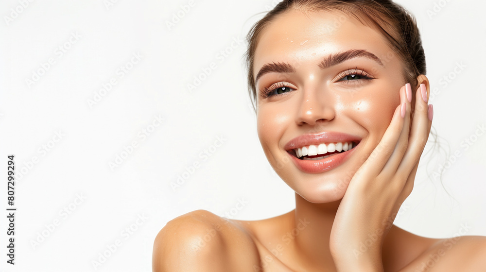 Photo of beautiful woman with happy face expression, perfect clean skin touching her cheek and smiling isolated on white background. Beauty concept for spa or skincare brand banner ad. Photo of beautiful woman with happy face expression, perfect clean skin touching her cheek and smiling isolated on white background. Beauty concept for spa or skincare brand banner ad.