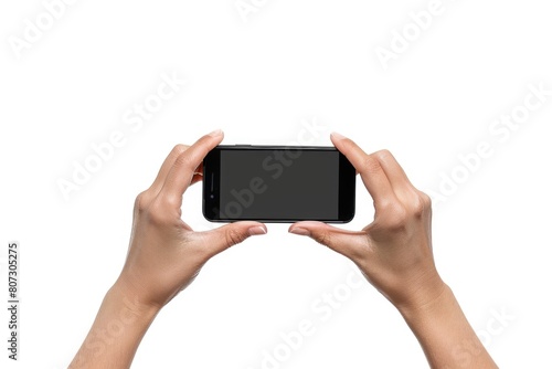 Person holding Phone horizontally in both hands on white background. Smartphone in hand for taking