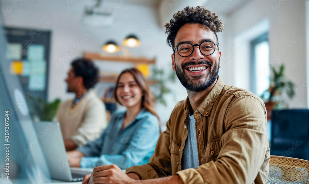 Obraz premium people working together in a office, diverse team of young professionals. Tech startup, casual, grad students, man, woman, beard