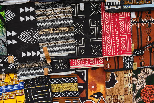 Mixture of traditional African Ghanaian black white and red based multi pattern wax block cotton print materials
