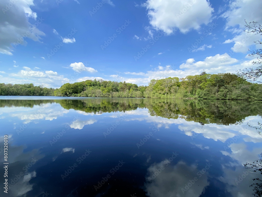 Fototapeta premium A view of Blakemere Lake near Ellesmere on a sunny day