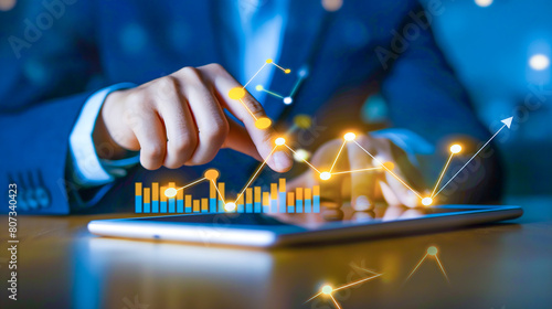 Strategic Business Analysis, Professional Businessman Analyzing Financial Graphs on a Digital Tablet, Highlighting Growth and Trends