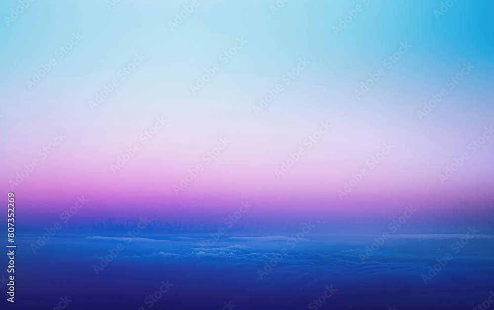 Smooth gradient of blue to purple hues.