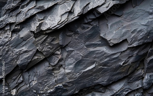 Textured dark slate with intricate natural patterns.