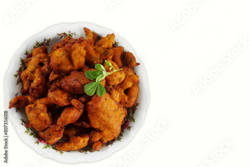 Canvas Print indian gujarati traditional holiday fritter snack fenugreek pakoda also known in