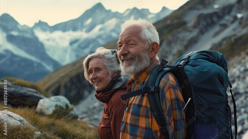 Portrait of a retired couple hiking in the Alps. Adventures in retirement.