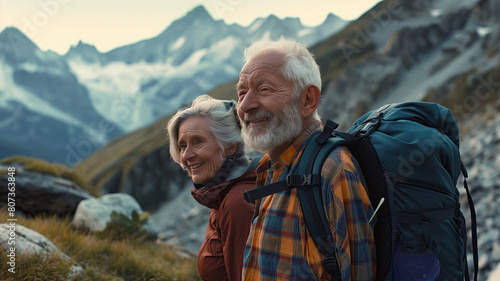 Portrait of a retired couple hiking in the Alps. Adventures in retirement. © Татьяна Прокопчук