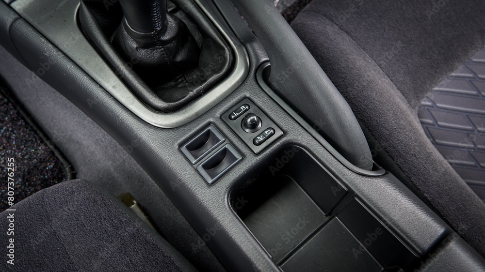 Mirror controls in a car Mirror controls in a car