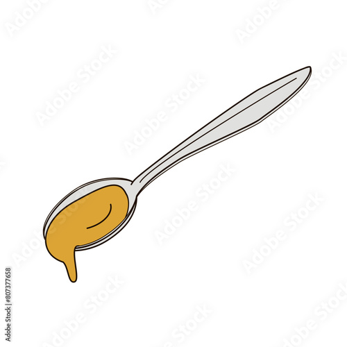 metal tablespoon with liquid