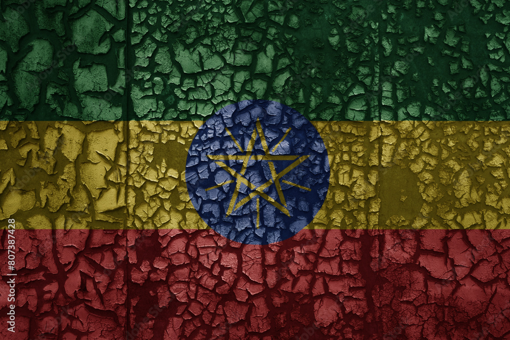 Fototapeta premium flag of ethiopia on a old grunge metal rusty cracked wall background