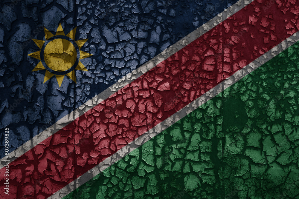 flag of namibia on a old grunge metal rusty cracked wall background flag of namibia on a old grunge metal rusty cracked wall background