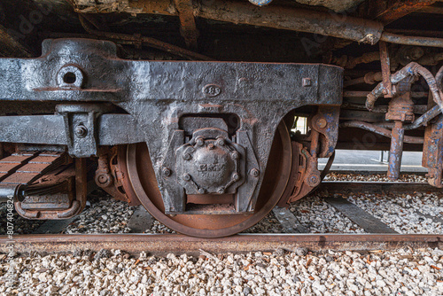 Steam train wheels on railroad track