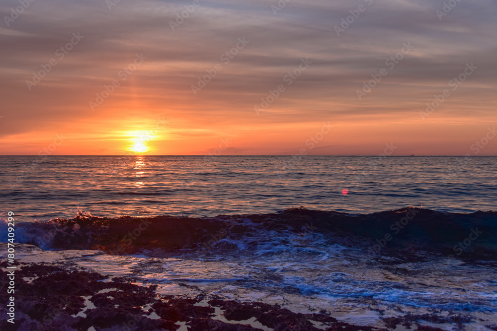 Obraz premium Sunset in Cyprus. View of Paphos coast at sunset. Evening landscape of Cyprus.