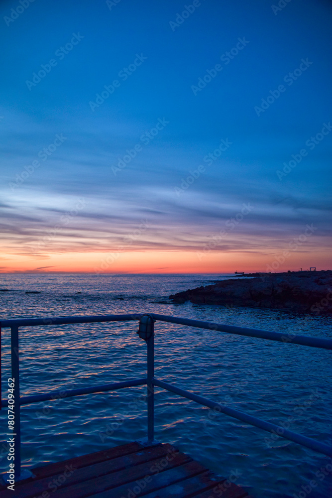 Sunset in Cyprus. View of Paphos coast at sunset. Evening landscape of Cyprus.