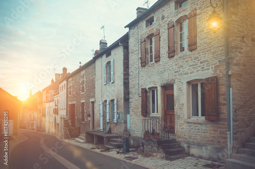 Summer view of Bligny-sur-Ouche narrow streets and stone houses  France