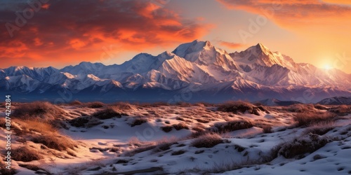 Breathtaking sunset over snow-capped mountains