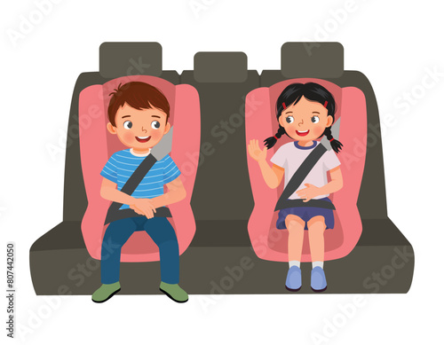 Cute little kids sitting in car seat putting seat belt for safety