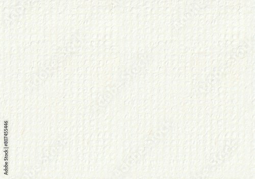 Seamless dot holes pattern decorated white paper napkin texture. Soft clean corrugation embossed lines doily serviette background. photo