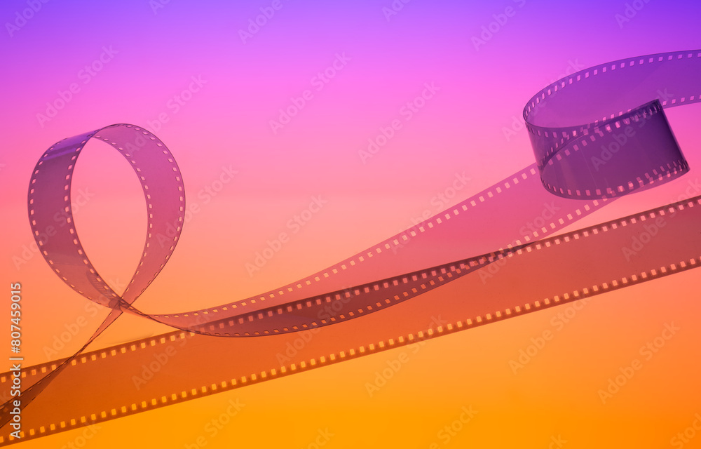 color cinema background with real film strip