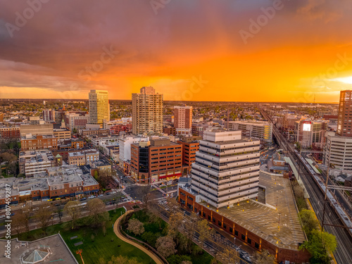 Aerial view of New Brunswick New Jersey downtown with colorful orange sunset sky
