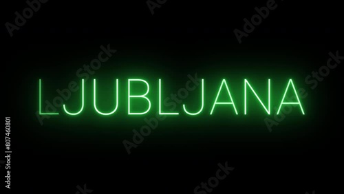 Flickering neon green glowing ljubljana text animated on black background photo