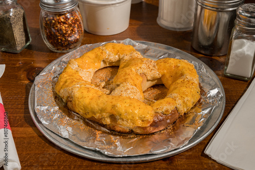 Soft pretzel with crab dip and cheese photo