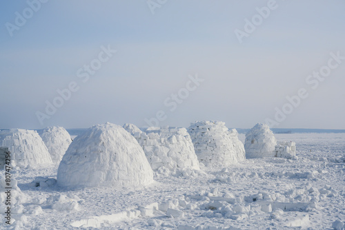 Competition for the construction of an igloo  a national shelter from the cold of the northern peoples  made of snow bricks