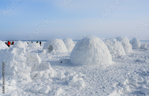 Competition for the construction of an igloo  a national shelter from the cold of the northern peoples  made of snow bricks