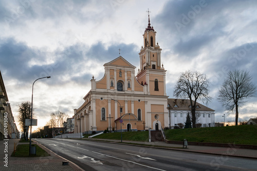 The Church of the Finding of the Holy Cross (an active Catholic church) and the Bernardine Monastery on a sunny day, Grodno, Belarus photo