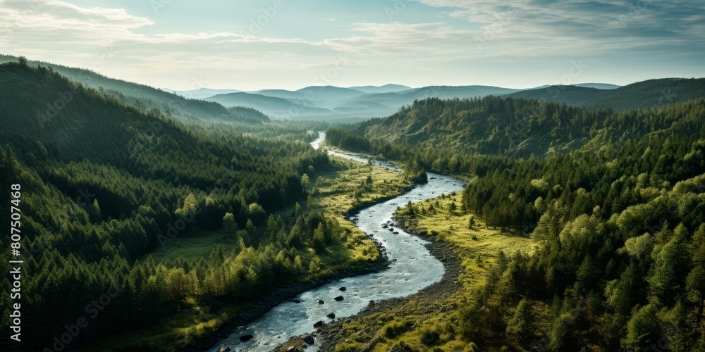 Scenic mountain landscape with winding river and lush green forest