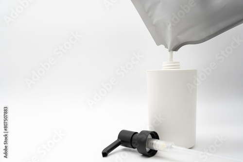 Refill to reduce plastic waste. soap or shampoo for refill. plastic bottles for refill liquid soap, shampoo and other products. Zero waste. Reuse reduce recycle concept.