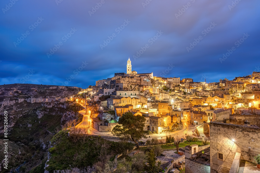 Fototapeta premium Matera in southern Italy with the Gravina at night