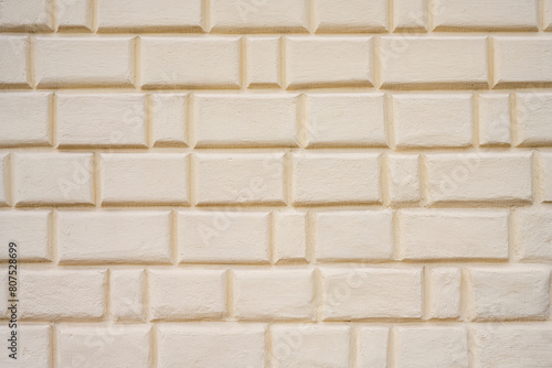 Background from a beige old brick wall