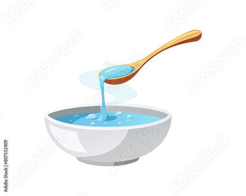Soup in a bowl with wooden spoon isolated on white background.