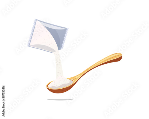 Pouring msg into a wooden spoon isolated on white background. photo