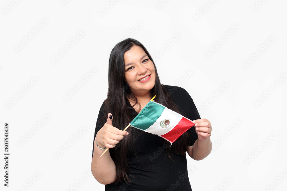Latin adult woman shows her thumb inked with indelible electoral ink after exercising her right to free and secret voting Latin adult woman shows her thumb inked with indelible electoral ink after exercising her right to free and secret voting