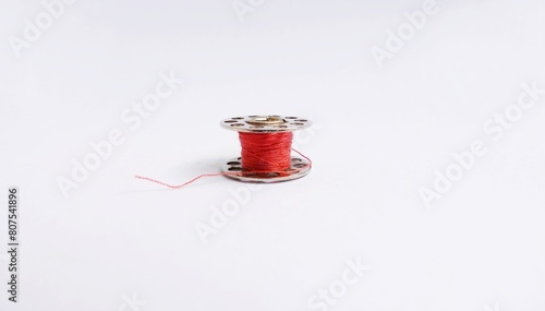 Bilde på lerret Close up photo of a sewing machine spool or bobbin made of metal