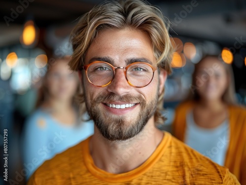Smiling Man With Beard and Glasses