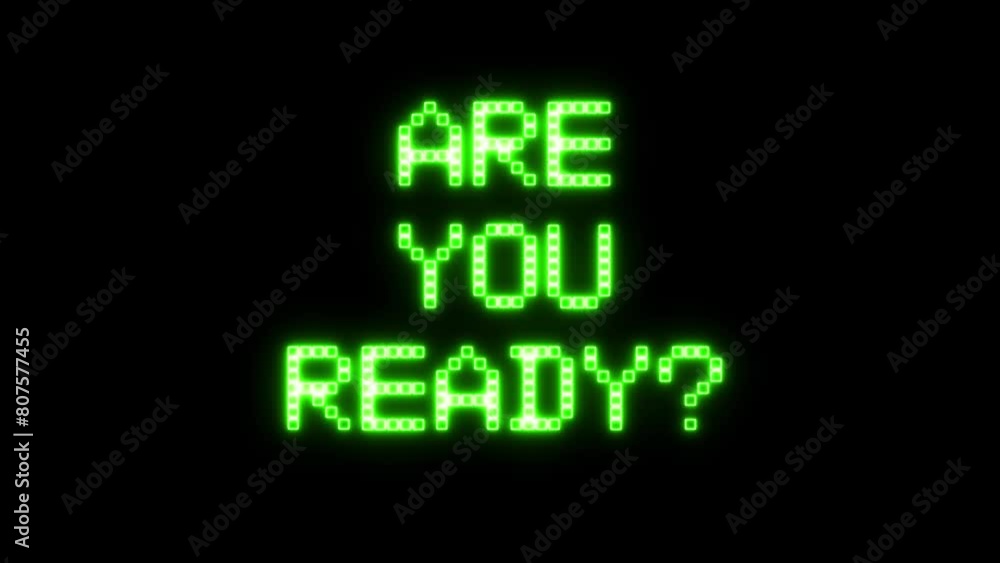 Animation: flickering neon text appears on the screen, asking Are you ready? Retro-futuristic green blocks style. Animation: flickering neon text appears on the screen, asking Are you ready? Retro-futuristic green blocks style.