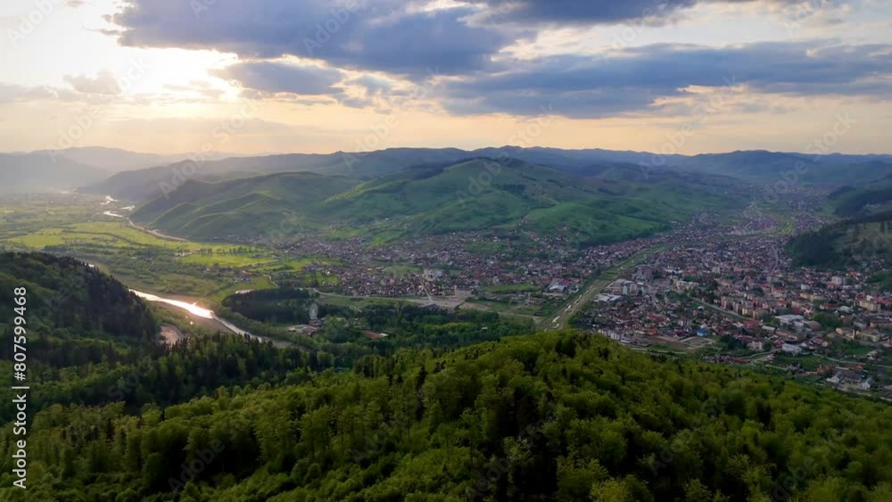 Drone aerial view of Gura Humorului city at sunset Drone aerial view of Gura Humorului city at sunset