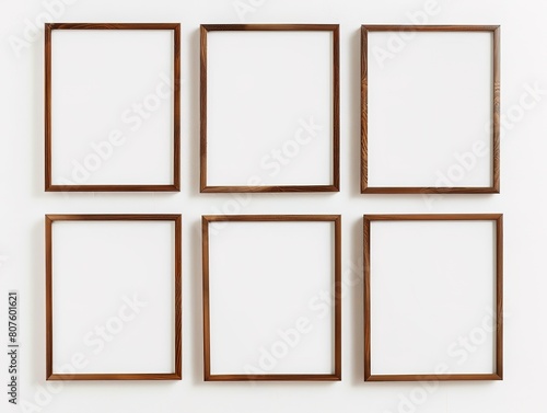Minimalist wooden frames on white background  symmetrically