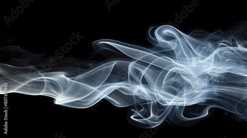 White smoke dispersing against a black backdrop